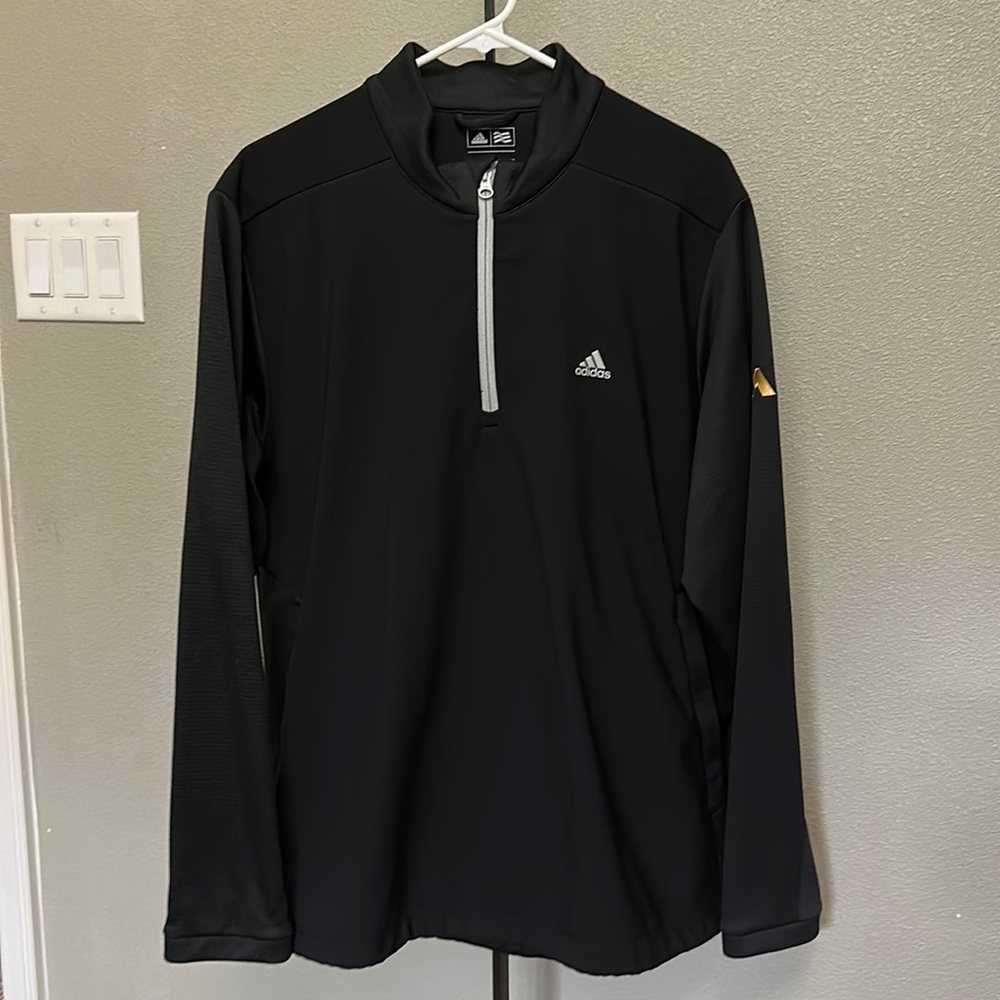Men’s black pull over Adidas size large, half zip front